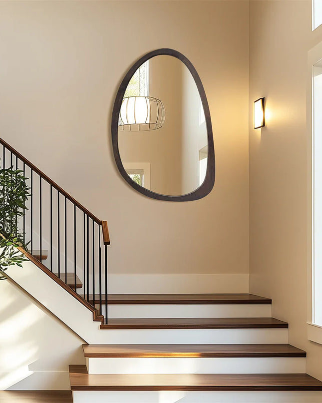 asymmetrical-wall-mirror-black-frame-staircase