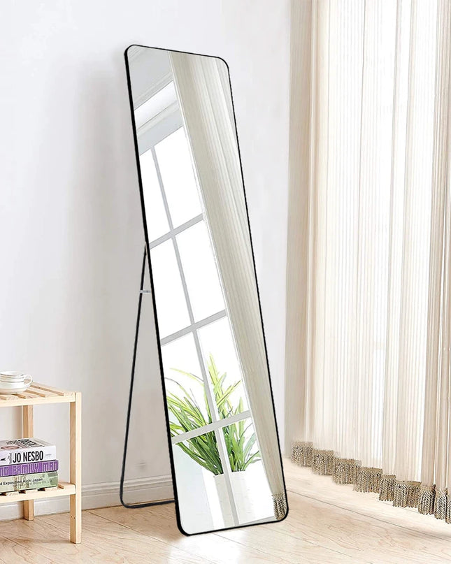 full-length-standing-mirror-black-metal-frame-by-window